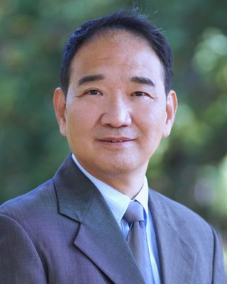 Photo of Dr. Eric Yeung, Registered Social Worker, PhD, MSocSc