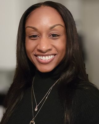 Photo of Nia Grant, MA, LPC, CMFT, CAMS, DCC, Licensed Professional Counselor
