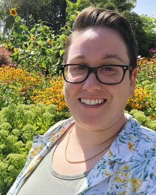 Photo of Izzy McQueen, LMHC-D