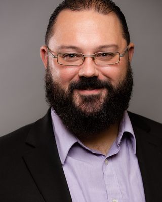 Photo of Aaron Combs, Licensed Professional Counselor, MS, LPC, MT-BC