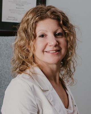 Photo of Erin Ruell, Counselor, LMHC, 500 RYT
