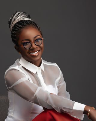 Photo of Kike Aderibigbe, Counsellor, CCC, MA