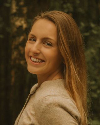 Photo of Aimee Smith, Counsellor, UKCP Trainee