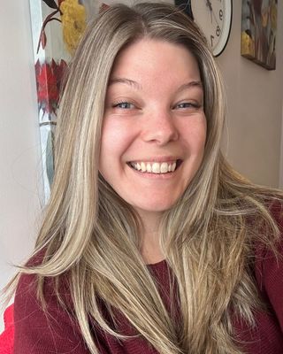 Photo of Emily Flood, Registered Psychotherapist, MACP, BHScKin