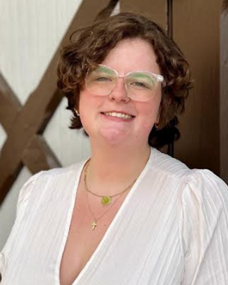 Photo of April Sage, Counselor, MA, QMHP-T