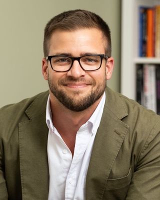 Photo of Dr. Tyler D. Hudson, Counselor, PhD, LPCC, NCC, CWC