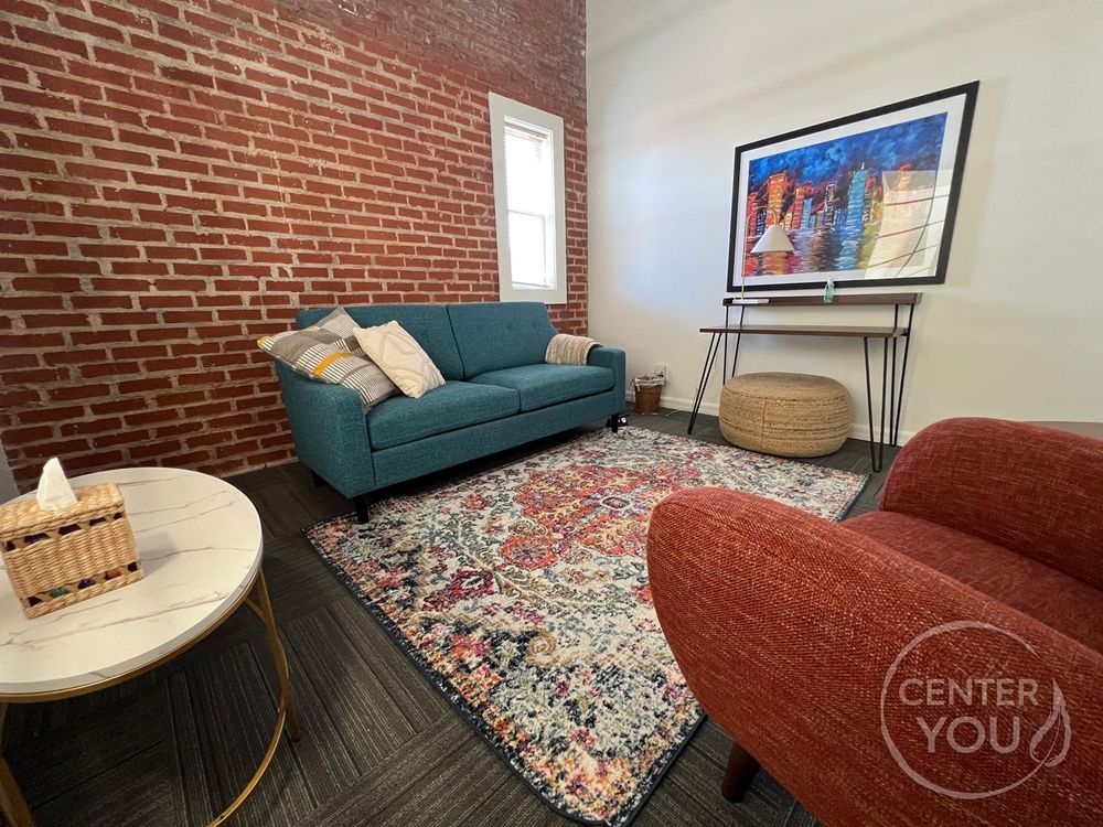 Warm colors, natural light and exposed brick office suite