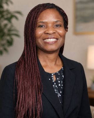 Photo of Kelechi Olukaikpe Ogom, Psychiatric Nurse Practitioner
