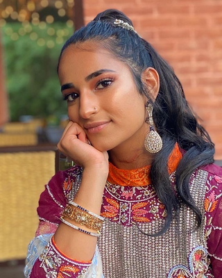 Photo of Muzna Mahmood, Pre-Licensed Professional