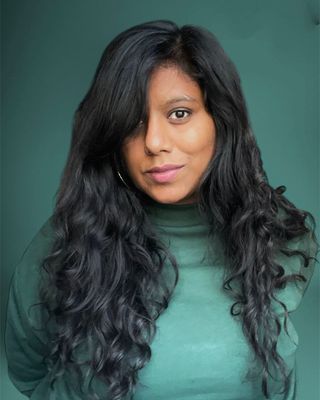Photo of Dilshini Sandhu, Psychotherapist, MSc, GMBPsS