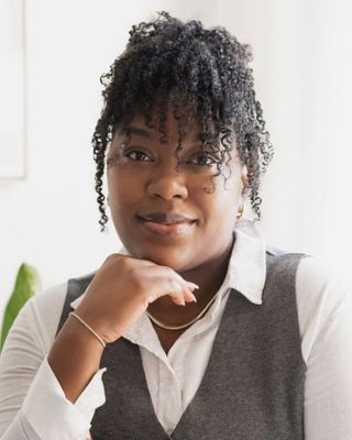 Photo of Myisha Wallace, Marriage & Family Therapist Intern, RMFTI