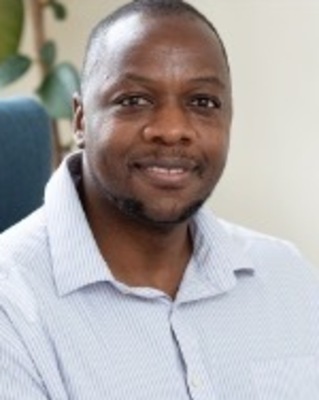Photo of Munya Chigwada, Psychotherapist, MSc, MBABCP