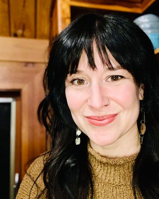 Photo of Ashley 'bird' Sandau, Counselor, MA, LMHCA, R-DMT