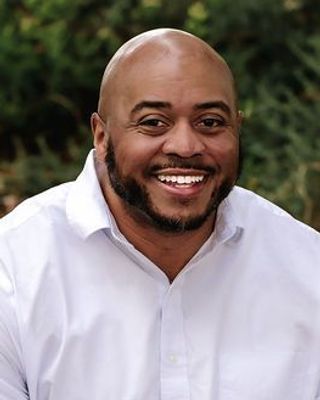 Photo of Dr. Joshua Wells, PhD, LPCA, LPCC