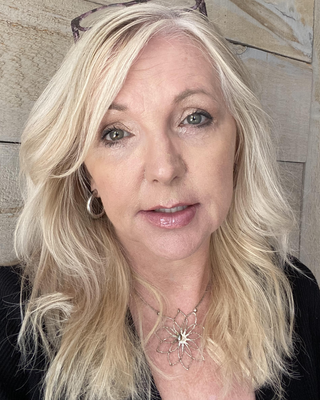 Photo of Kelly Atkinson, Registered Psychotherapist (Qualifying), MACP, CRPO, CCC