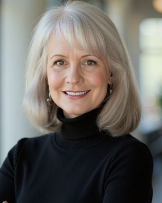 Photo of Dr. Lisa Metcalf, Clinical Social Work/Therapist, EdD, LCSW, RPT-S