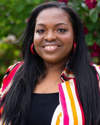 Photo of Caroline Flowers Tomekowou, LMHC, PMH-C, Counselor in Worcester