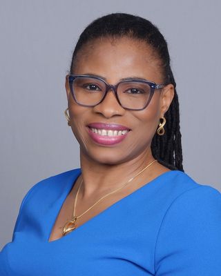Photo of Esther W Ekanem, Counselor, LMHC-D, CASAC, NCC