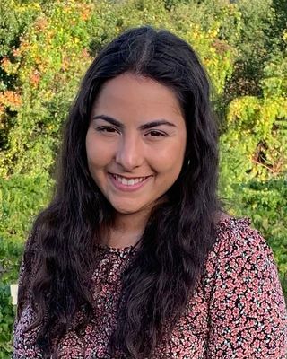 Photo of Caroline De Oliveira, Pre-Licensed Professional