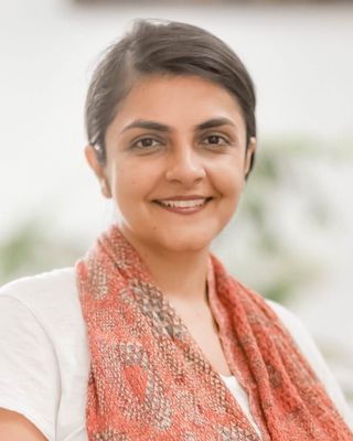 Photo of Deepika Mulchandani, MSocSci, CMSAC, Psychotherapist