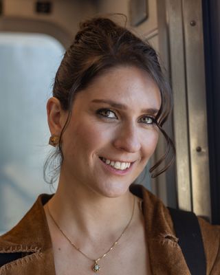 Photo of Erin Poland, Creative Arts Therapist, ATR-BC, LCAT, LMHC