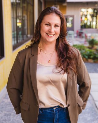 Photo of Ashley Emmons, Licensed Clinical Mental Health Counselor, LCMHC, RYT200