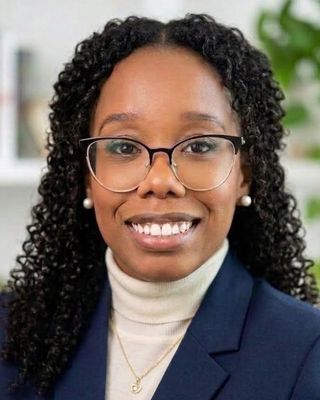 Photo of Queen S Moore, Counselor, LMHC, LADC