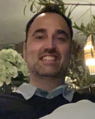 Photo of Dr. Andres Vinuela, Psychiatrist, MD