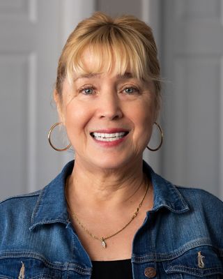 Photo of Kathryne J Arnold, Counselor, MS, LMHC, CIMHP, NBCFCH