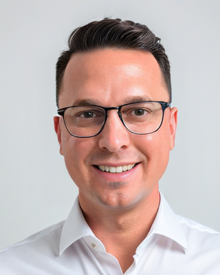 Photo of Joshua Smalley - Thrive Together Mental Wellness Centres, Psychiatrist, MD, MSc, FRCPC