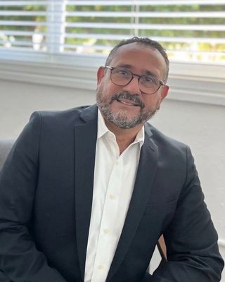 Photo of Leonel Juan Garciga, Licensed Mental Health Counselor, LMHC