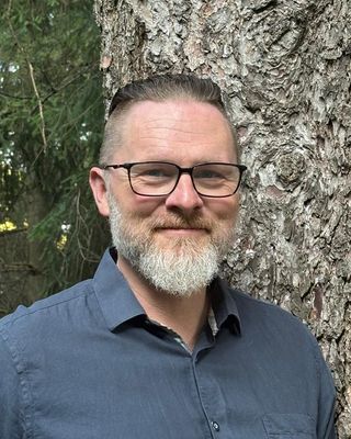 Photo of Simon Jo-Keeling, Registered Psychotherapist, MACP, PhD