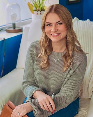 Photo of Emily Kohls, Licensed Clinical Mental Health Counselor, MAEd, LCMHC, LCAS, NCC