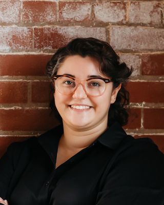 Photo of Liv Noël Dakkak - Liv Noël Dakkak: Neurodivergent Therapist, Registered Social Worker, MSW, RSW