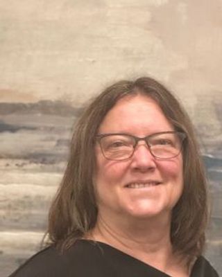 Photo of Laura Enos, Licensed Master Social Worker, LMSW